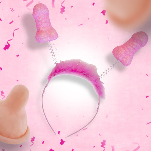 Vrolijke roze diadeem met glitterpenissen en confetti voor vrijgezellenfeest versiering Piemel haarband